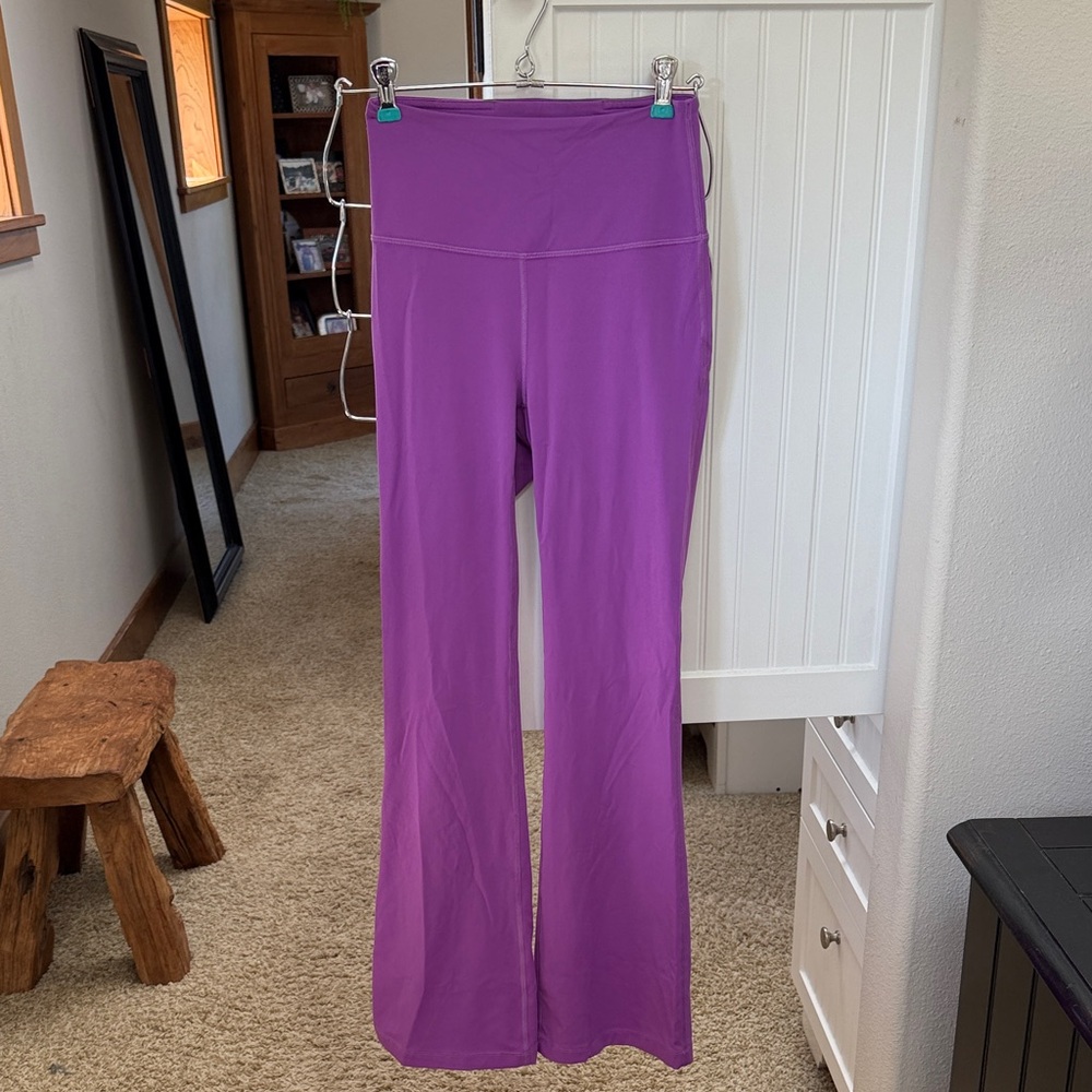 Lululemon purple size 4 flare leggings. Perfect condition!